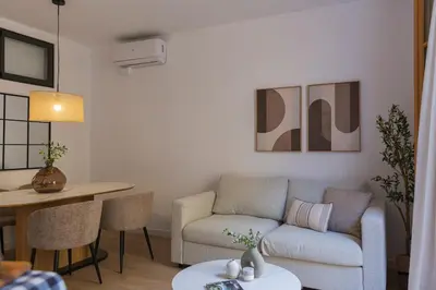 a living room with a couch and a table at Barcelona - Gracia 2-B in Barcelona