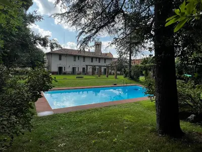 a house with a swimming pool in a yard at Habitaciónes en casa exclusiva en Centelles in Centellas
