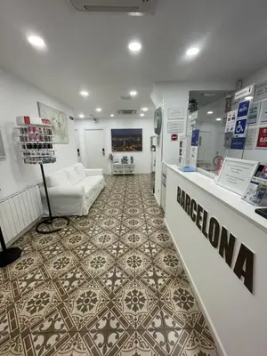 a store with a room with a tile floor at Hostal Nova Barcelona in Barcelona