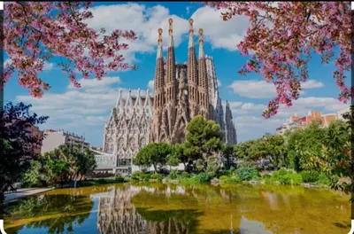 a cathedral with a pond in front of it at Premium refurbished apartment in Barcelona city center in Barcelona