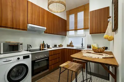 a bedroom with a large bed and a window at Timor - 2 bedrooms and balcony in Eixample Dreta in Barcelona