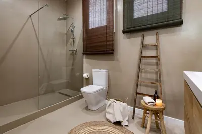 a white bedroom with a bed and a mirror at Bingin - 3 bedrooms and balcony in Eixample Dreta in Barcelona