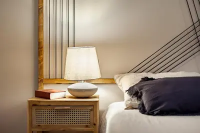 a bedroom with a bed and a ceiling fan at Bingin - 3 bedrooms and balcony in Eixample Dreta in Barcelona