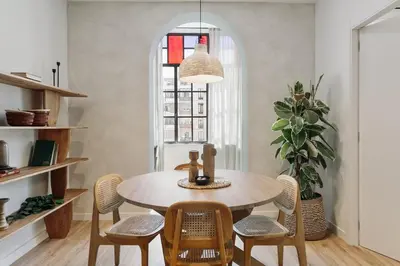 a home office with a desk and a window at Faro - 2 bedroom in Eixample Esquerra in Barcelona