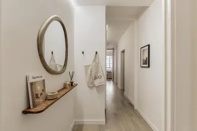 a living room with a couch and a table at Savegre - 3 bedrooms in Eixample Esquerra in Barcelona
