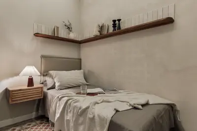 a bedroom with a mirror and a bed at Savegre - 3 bedrooms in Eixample Esquerra in Barcelona