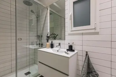 a bedroom with a bed with a tray on it at Savegre - 3 bedrooms in Eixample Esquerra in Barcelona
