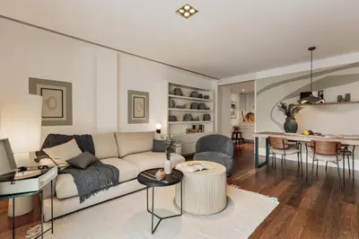 a kitchen with white cabinets and a sink at Cabuy - 1 bedroom in La Dreta de l'Eixample in Barcelona
