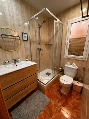 a bathroom with a shower and a toilet and a sink at Full flat in the heart of Barcelona in Barcelona