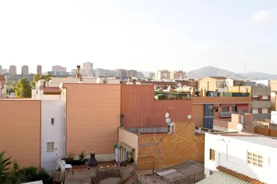 a view of the city from the roofs of buildings at 3rooms, 10 minAirport, free parking, public transp in Cornellà de Llobregat