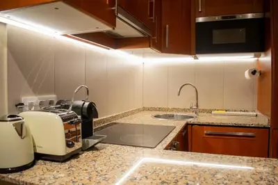 a kitchen with a sink and a toaster at 