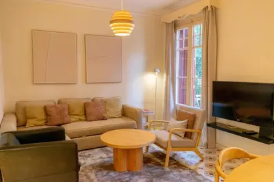a living room with a couch and a table at 