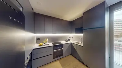 a kitchen with a sink and a stove at 1 Bedroom Cozy Aparment Joan Austria in Barcelona