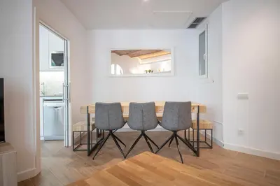 a kitchen counter with a toaster on top of it at Uptown Barcelona You Stylish Apartments in Barcelona