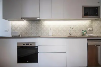 a bathroom with a sink and a shower at Uptown Barcelona You Stylish Apartments in Barcelona