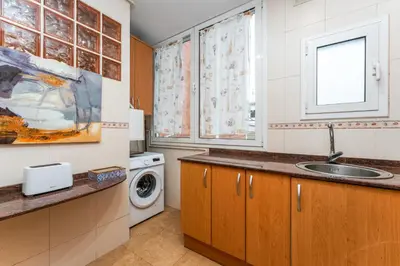 a bathroom with a sink and a counter top at Mediterranean and connected in Sant Adria de Besos