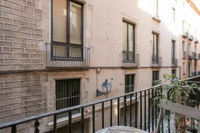 a building with balconies on the side of it at Canela Homes BARCELONA MERCÈ in Barcelona