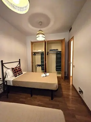 a bedroom with a bed in a room at Ramblas flat 3Bedroom and Pool Min 32 days in Barcelona