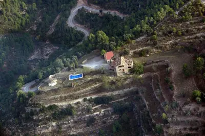 an aerial view of a house on a mountain at Music room in Montserrat in Castellbell i Vilar