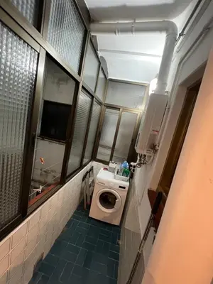 a small bathroom with a toilet and a sink at HABITACIÓN barcelona in Barcelona