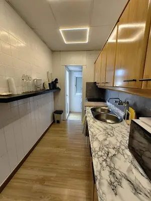 a kitchen with a sink and a counter at Apartamento en Montgat - Serenity Stays in Montgat