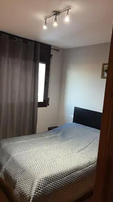 a bedroom with a bed and a window at Calle Ramon Berenguer Iv, 13, Sant Pere de Ribes barcelona 08812 in Vilanova i la Geltrú