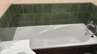 a bath tub with a faucet and a toilet at Calle Ramon Berenguer Iv, 13, Sant Pere de Ribes barcelona 08812 in Vilanova i la Geltrú