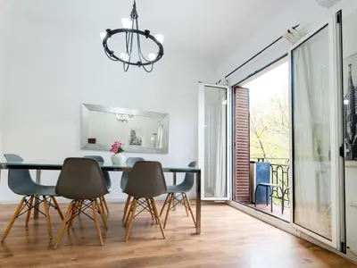 a dining room with a table and chairs at Apartment amazing Sagrada familia view II in Barcelona