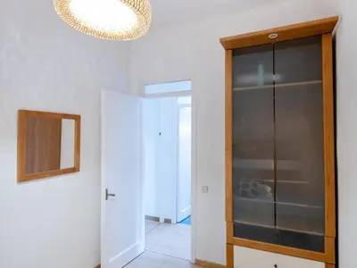 a room with a glass cabinet and a mirror at Apartment amazing Sagrada familia view I in Barcelona