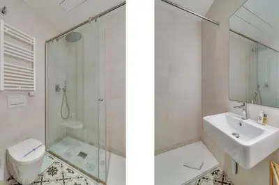 a bathroom with a shower and a sink and a toilet at Guest Ready - Modern apartment by Barcelona Port in Barcelona