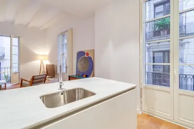 a kitchen with a sink and a window at Guest Ready - Modern apartment by Barcelona Port in Barcelona