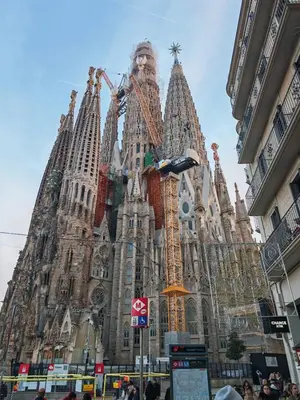 a large cathedral building with scaffolding on it at Badalona Old town in Badalona