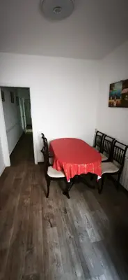 a room with a table with a red table cloth on it at Playa de Sant Adrià de Besòs in Sant Adria de Besos