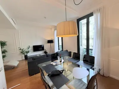 a living room with a couch and a table at CENTRAL CITY Ivax in Barcelona