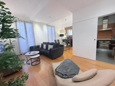 a living room with a couch and a table at CENTRAL CITY Ivax in Barcelona