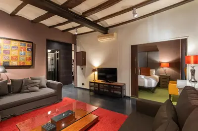 a living room with a couch and a bed at Stay U-nique Apartments Pou in Barcelona