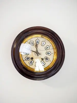 a clock is hanging on a wall at Torre d'en Malla in Martorell