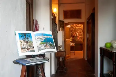 two pages of a book hanging on a wall at Torre d'en Malla in Martorell