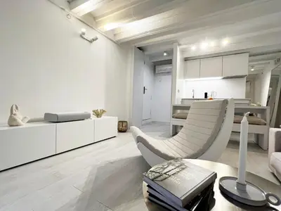 a living room with a couch and a table at Key White in Barcelona