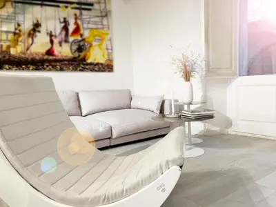 a living room with a couch and a table at Key White in Barcelona