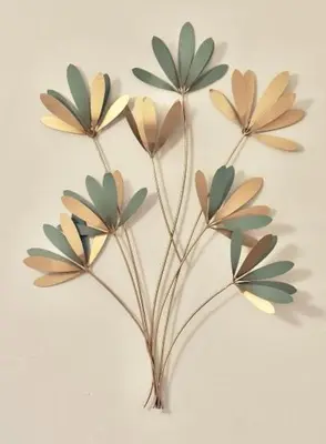 a group of four plants on a white wall at Entire Apartment in Barcelona, Camp Nou, Les Corts in Barcelona