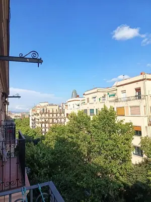 a view of some buildings from a balcony at Barcelona Eixample - Sagrada Familia - Monumental - City Center in Barcelona