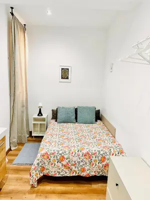 a bedroom with a bed and a sink in it at Habitación 4 zona centro in Barcelona
