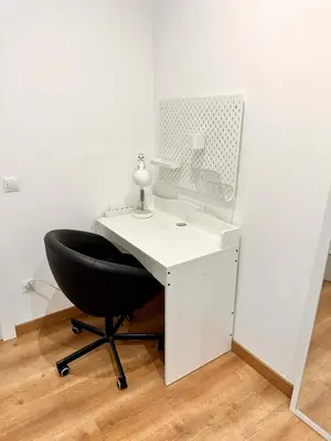 a shower with a glass door next to a sink at Habitación 4 zona centro in Barcelona