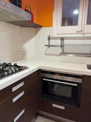 a kitchen with a stove and a stove top oven at Cozy Apartment in the Center Area Sagrada Familia in Barcelona
