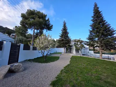 a house with a swimming pool next to a building at Casablanca-Private Family Mountain Home in El Amunt