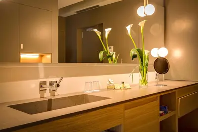 a bathroom with a sink and a mirror at Ohla Eixample in Barcelona