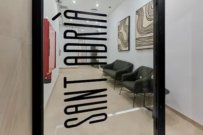 a waiting room at a salon with chairs at Sant Adrià Urban Suites by gaiarooms in Badalona