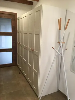 a room with a closet with a windmill next to it at La Casa Vella