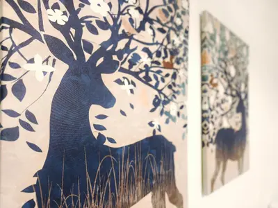 a painting of a tree with flowers on a wall at Apartamento en Vilassar de Mar, Costa de Barcelona in Vilassar de Mar